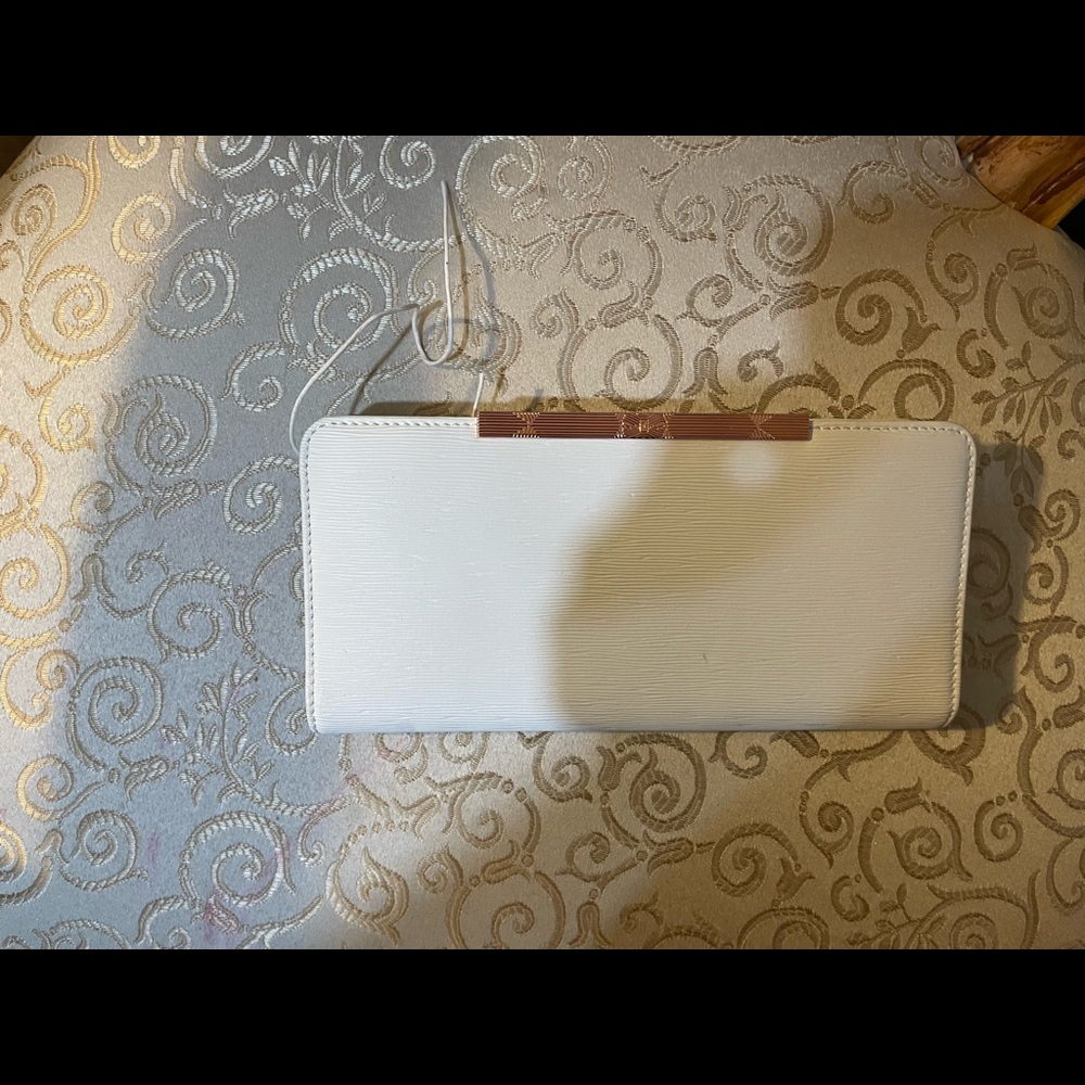 NWT winter white w/ gold accent long wallet. Ted Baker
